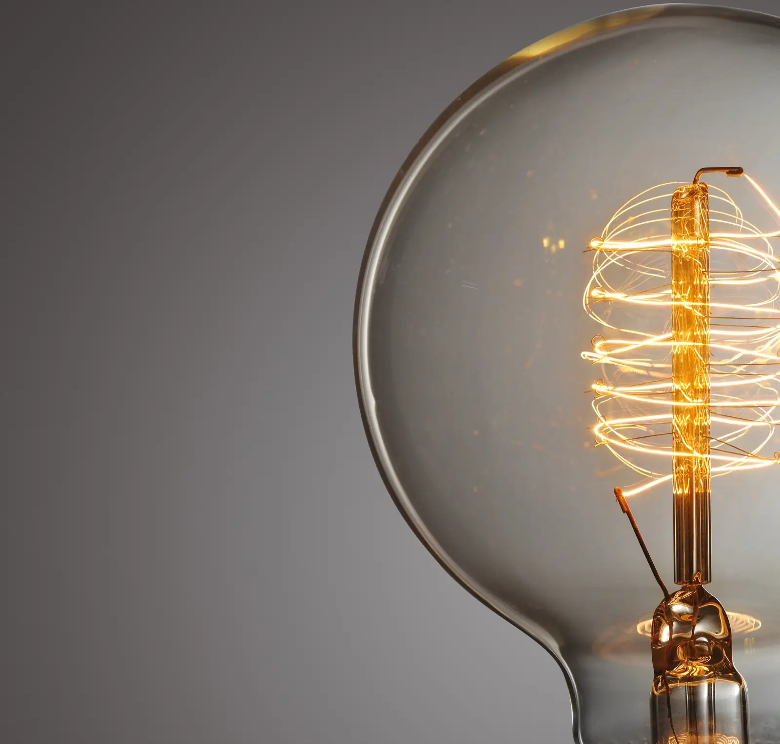 Close up glowing vintage light bulb